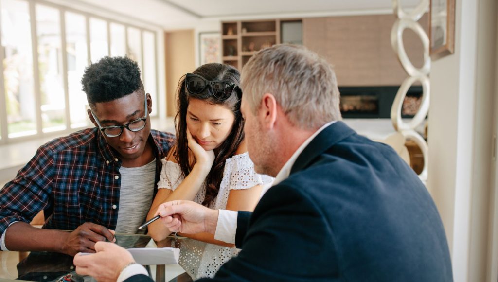 First-time home buyers working with our knowledgeable mortgage broker.